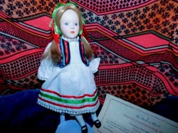 8.5 IN DANBURY MINT PORCELAIN SOPHIE DOLL FROM POLAND, or SWITZERLAND, STAND, CERTIFICATE